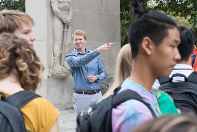 Visual arts faculty member James Jewitt speaks to students 